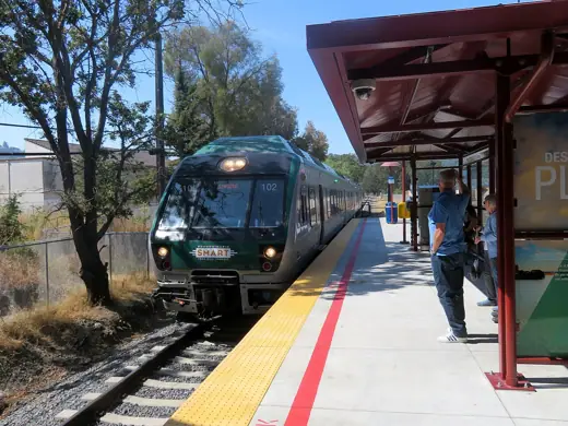 Photo 4: Exterior · Northbound train arriving at Marin Civic Center station in August 2018