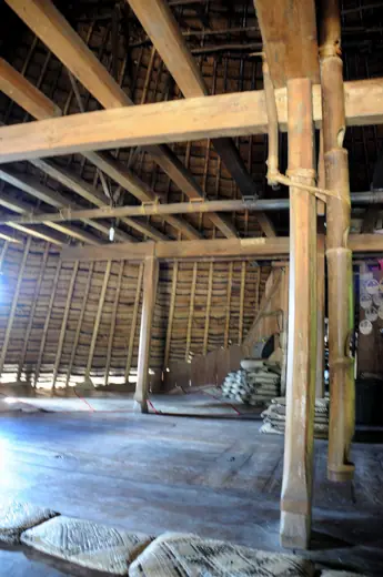 Photo 5: Interior · Interior of a traditional Mbaru Niang house in Wae Rebo, Flores Island, Indonesia