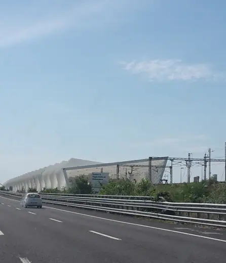 Photo 5: Context · This is the tail of the Reggio Emilia train station, seen from the highway