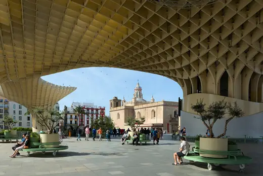 Photo 3: Exterior · Seville (Andalusia, Spain) - View of Iglesia de la Anunciación from under Metropol Parasol