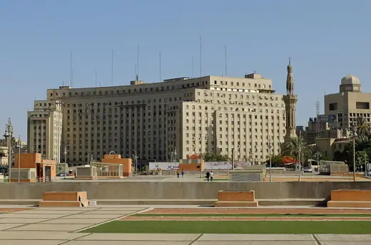 Photo 2: Exterior · Mogamma building at Tahrir Square in Cairo (with the minaret of the Omar Makram Mosque on the right)