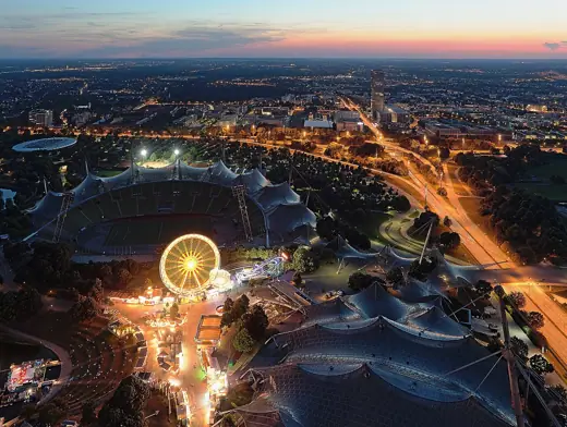 Photo 2: Exterior · Olympiastadion, Munich, at dusk