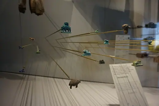 Photo 4: Exterior · Small museum artifacts displayed at the Musée des Confluences