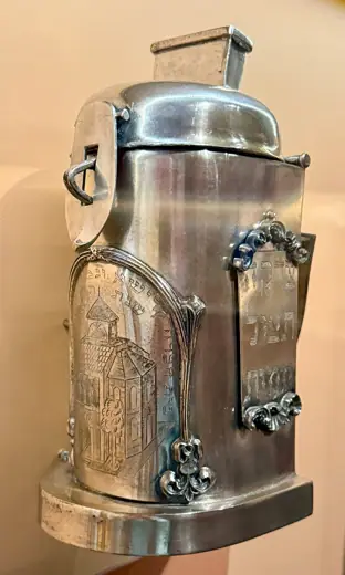 Photo 2: Exterior · Charity Box