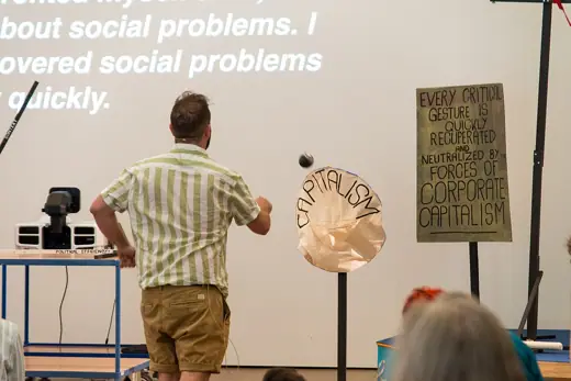 Photo 2: Exterior · Darren Roshier Performance How Can This Performance (Really) Defeat Capitalism?