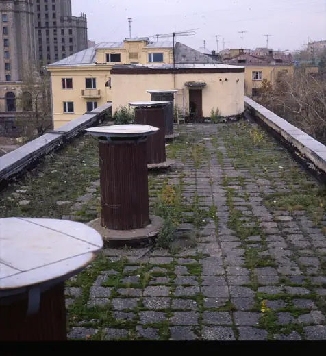 Photo 4: Exterior · This photo was taken around 1973 , on the roof of the building