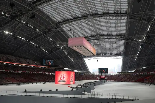 Photo 4: Exterior · This is a photo of Singapore's National Day Parade 2026, located at the National Stadium