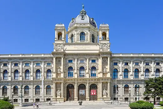 Photo 6: Detail · A wide-angle, daytime photograph showcases the grand facade of the Natural History Museum in Vienna, Austria
