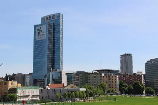 Photo 4: Exterior · Piazza Gae Aulenti in downtown Milan, Italy featuring Palazzo Lombardia, the hq of Lombardy's regional govt