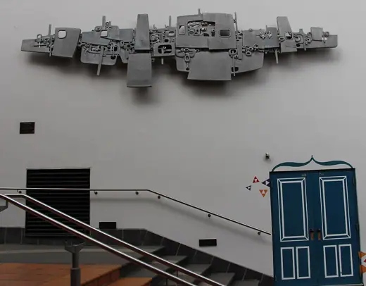 Photo 5: Detail · Sculpture on the wall of Palmerston North City Library