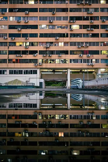 Photo 3: Interior · People's Park Complex taken from its rooftop, showing reflection off a puddle of rainwater