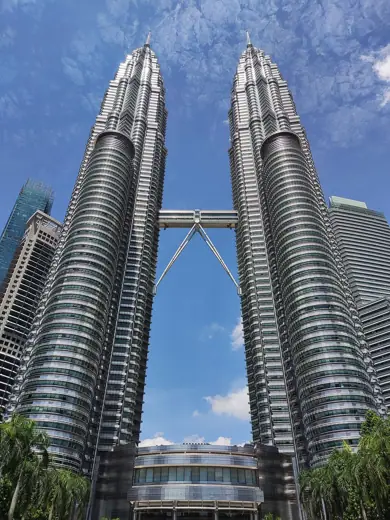 Photo 2: Exterior · The Petronas Twin Towers are a pair of 88-storey supertall skyscrapers in Kuala Lumpur