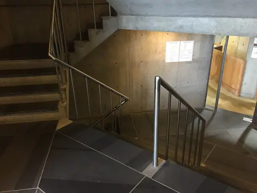 Photo 7: Interior · One of the staircases in the library