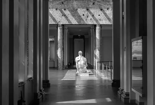 Photo 6: Interior · A line of galleries of the Pinacoteca do Estado, with a statue closing the view