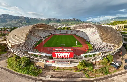 Photo 4: Exterior · Poljud Stadium with the Kozjak Mountains in the distance