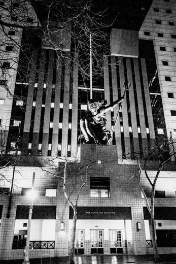 Photo 2: Exterior · A nighttime view of the Portland Building in Portland, Oregon