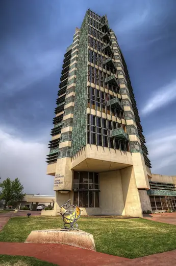 Photo 4: Exterior · Frank Lloyd Wright's only realized high rise building was completed in 1956 in Bartlesville, Oklahoma