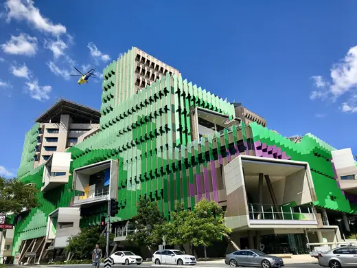 Photo 4: Exterior · Medical helicopter taking off the helipad of Lady Cilento Children's Hospital, Brisbane, Queensland