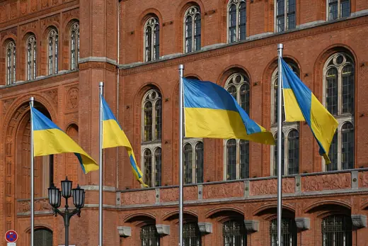 Photo 4: Exterior · The national flag of Ukraine in front of the Rotes Rathaus in Berlin , Germany 