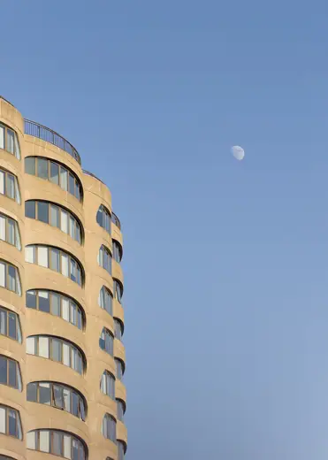 Photo 4: Exterior · View of the River City building along with the Moon from the Chicago River