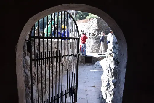 Photo 3: Interior · Another low doorway in the Rock Garden
