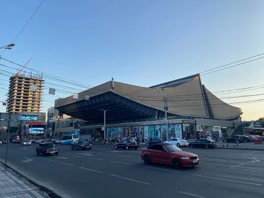 Photo 3: Exterior · The former Cinema Rossiya, built in Soviet times, now a mall, July 2023