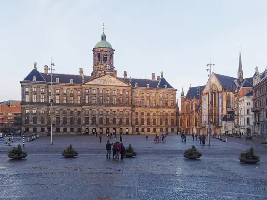 Photo 4: Exterior · View of Dam square, Amsterdam, with the Royal Palace of Amsterdam and the Nieuwe Kerk