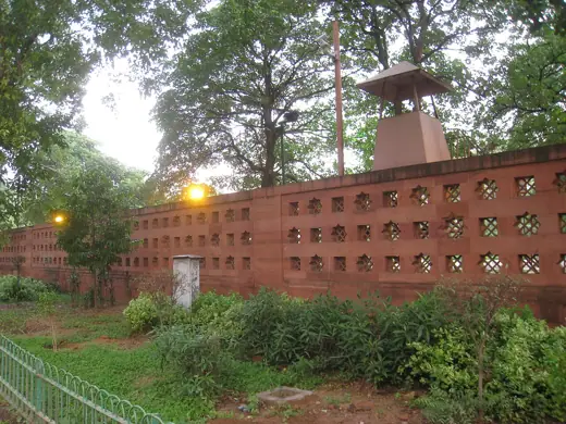 Photo 2: Exterior · Wall outside Sansad Bhavan parking lot at dawn, New Delhi, India