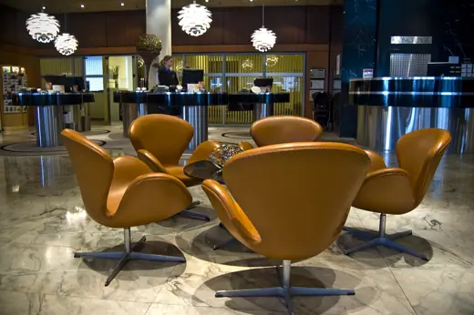 Photo 5: Interior · Arne Jacobsen's Swan chairs in the Royal Hotel Lobby in Copenhagen for which they were created