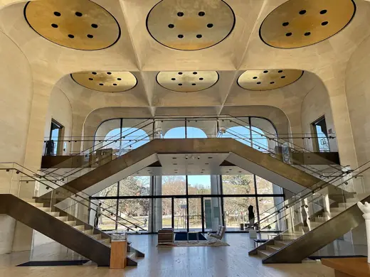 Photo 6: Interior · Sheldon Museum of Art's view upon entering the building and sitting area