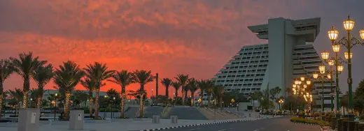 Photo 4: Exterior · Entrance to iconic Sheraton Hotel in West Bay district of Doha, Qatar