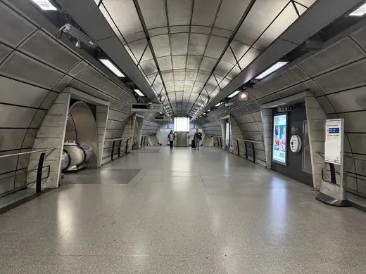 Photo 4: Exterior · The concourse leading to the westbound and eastbound platforms at Southwark tube station, July 2024