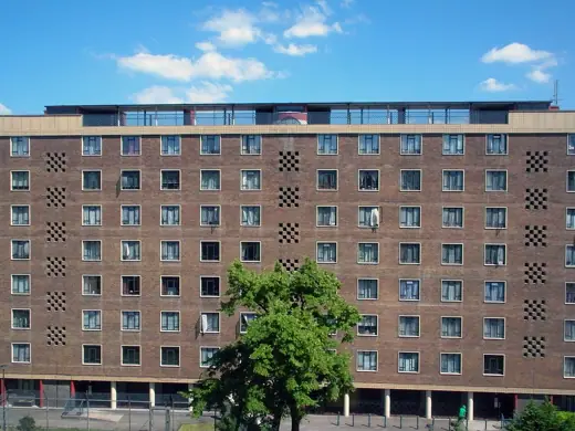 Photo 5: Interior · view acroos plaza include 'wind roof' and tree preserved in Lubetkin's design