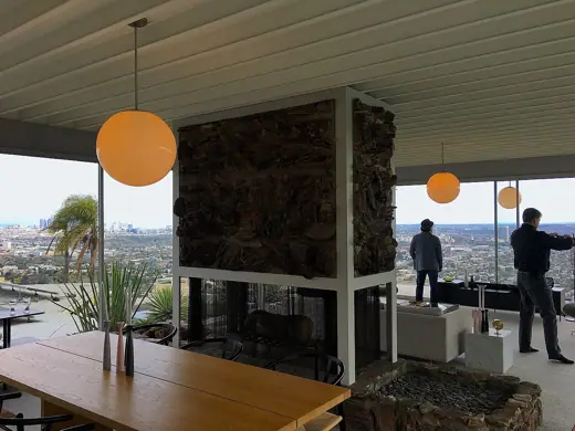 Photo 5: Interior · The dining room and fireplace of the Stahl House