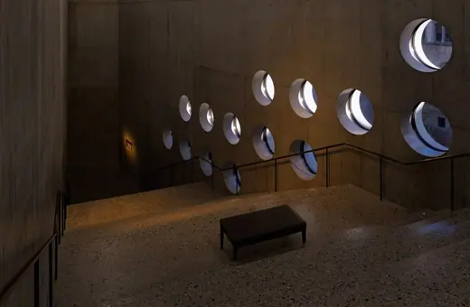 Photo 5: Interior · Round windows and staircase at the museum extension, Swiss National Museum, Zurich, Switzerland