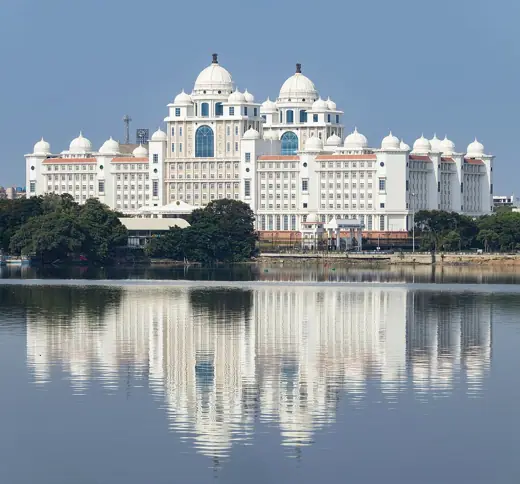 Photo 1: Exterior · Symmetrical view of the Indo-Saracenic styled Dr