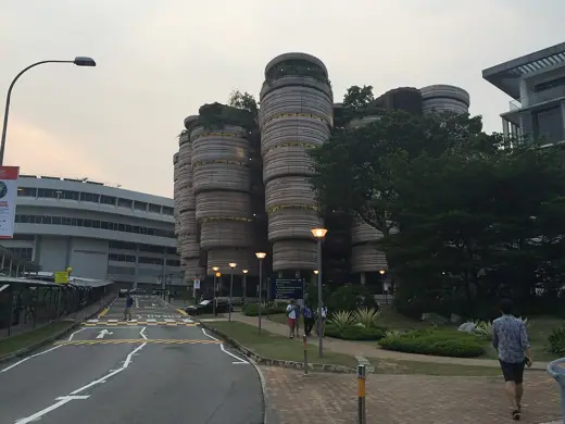 Photo 2: Exterior · The hive building during the afternoon with slight illumination