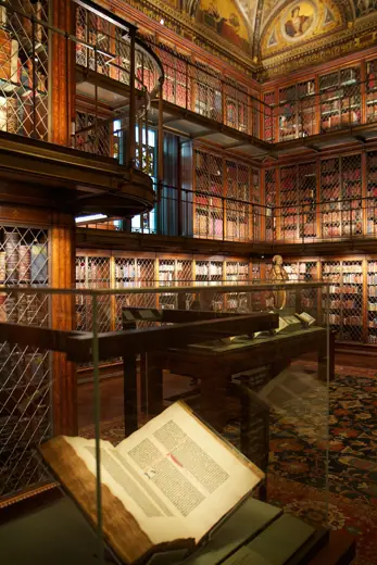 Photo 5: Interior · A Gutenberg Bible rests in a case in the library (east) room at the Morgan Library & Museum in New York City