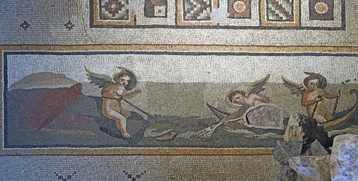 Photo 3: Exterior · A border of the large Pegasus mosaic has sets of animals and some putti in a boat
