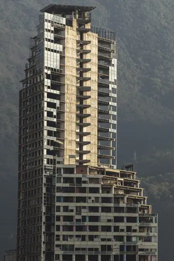 Photo 1: Exterior · El Centro Financiero Confinanzas, o Torre de David, es un rascacielos no terminado en Caracas, Venezuela