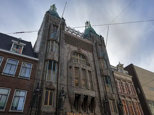 Photo 2: Exterior · The Tuschinski Theater on the largely empty Reguliersbreestraat during the corona crisis