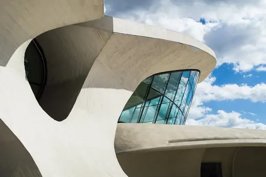 Photo 3: Exterior · TWA Flight Center exterior showing the concrete forms and large glass panels
