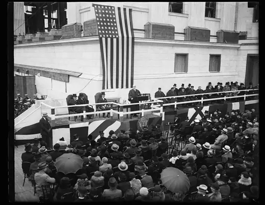 Photo 3: Exterior · Title: Charles Evans Hughes addressing group at U.S
