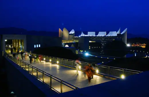 Photo 6: Context · View of the campus during the night time