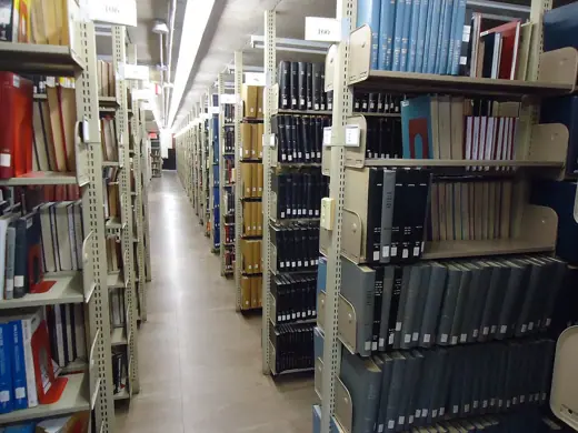 Photo 6: Interior · Stacks and books in the DuBois library, at the University of Massachusetts Amherst