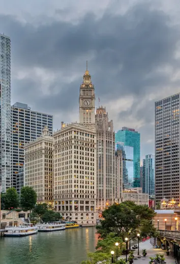 Photo 2: Exterior · View eastward along the main branch of the Chicago River in downtown Chicago, Illinois, during blue hour