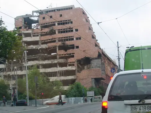Photo 5: Context · The damaged Generalštab on Nemanjina Street in Belgrade in 2005